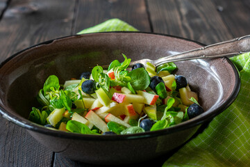 Salad with fruit and vegetable