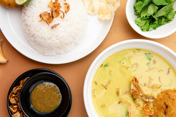 Nasi Soto Ayam or Soto Medan is  Traditional chicken soup with rice from Medan, North Sumatra. 

Soto is a traditional Indonesian soup mainly composed of broth, meat, fried patties and vegetables.