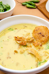 Nasi Soto Ayam or Soto Medan is  Traditional chicken soup with rice from Medan, North Sumatra. 

Soto is a traditional Indonesian soup mainly composed of broth, meat, fried patties and vegetables.