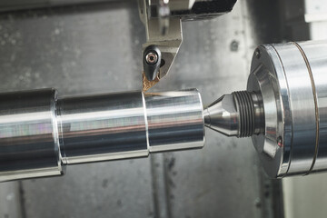 turning operation on cnc machine. metal cut industry for manufacturing and machining
