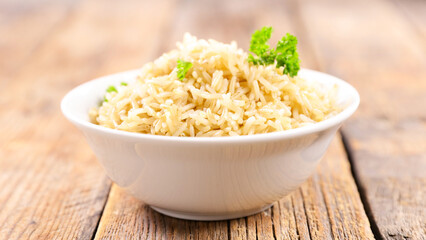 bowl of rice on wood background