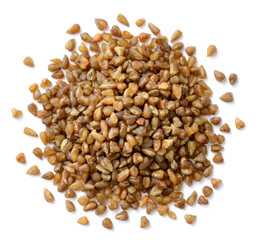 uncooked bitter buckwheat isolated on the white background, top view