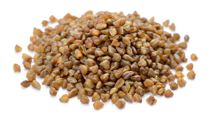 uncooked bitter buckwheat isolated on the white background