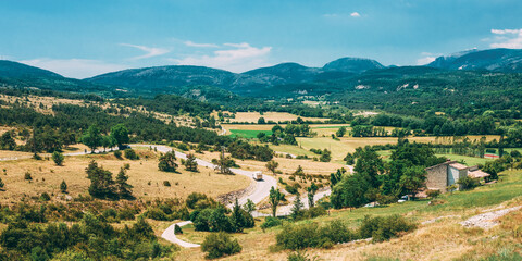 Fototapeta na wymiar Small Truck Drive In Beautiful Scenic View Landscape Near Village Of Trigance In Provence, France.