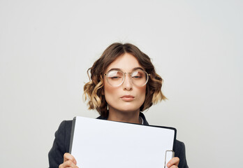 Naklejka premium Business woman in suit folder for papers blank sheet Copy Space
