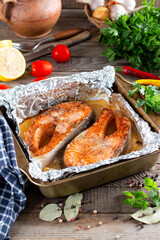 Foil pack dinner with fish. Fillet of salmon. Healthy diet food, keto diet, Mediterranean cuisine. Oven-baked hot dinner