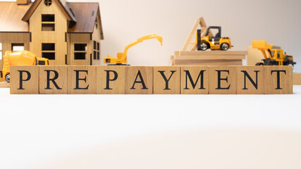Prepayment was created from wooden cubes. Finance and Banking.