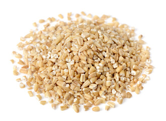 close up of raw steel cut oats isolated on white. (large depth of field, taken with tilt shift lens)