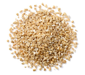 close up of raw steel cut oats isolated on white, top view