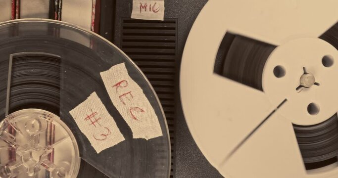 Vintage audio reel player. Reel audio recorder with tape rolls. 