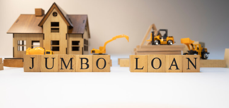 Jumbo loan was created from wooden cubes. Finance and Banking.