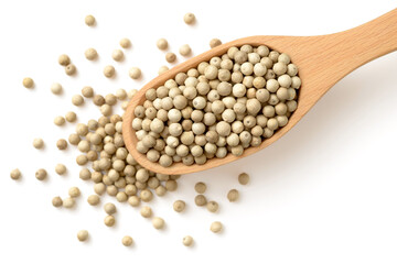 white peppercorns in the wooden spoon, isolated on white, top view