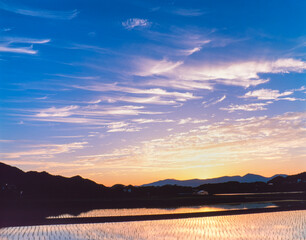 岩手県　雫石町　夕景の雲と田園風景