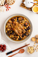 Stewed chicken soup with Chinese herbal medicine.  This soup very famous among chinese food and asian food as a healthy soup, food as medicine.