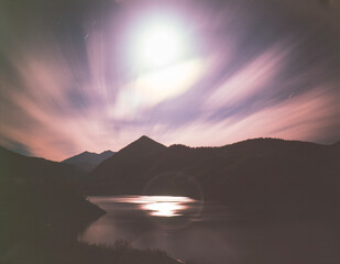 Fototapeta na wymiar 北海道　月と山々と大雪湖の印象　夜景