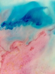 pink and blue marbled background swirl of ink fade and gradient of ink and dye 