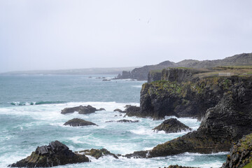 View of the fjords coastline at Snaefellsnes Peninsula, Iceland. Cloudy day during summer