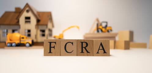 FCRA was created from wooden cubes. Finance and Banking.