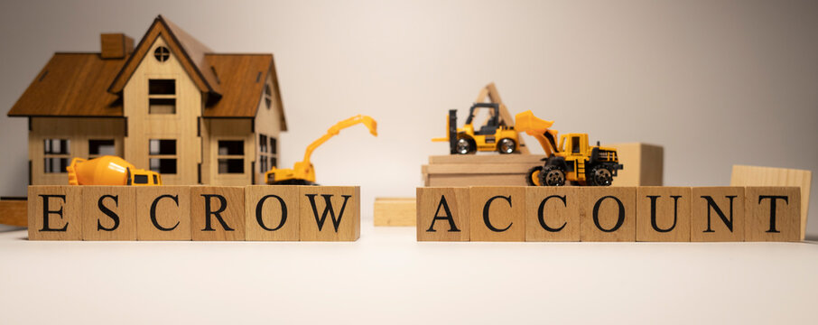 Escrow account was created from wooden cubes. Finance and Banking.