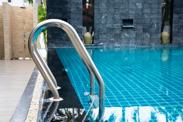 Swimming pool with stair in hotel