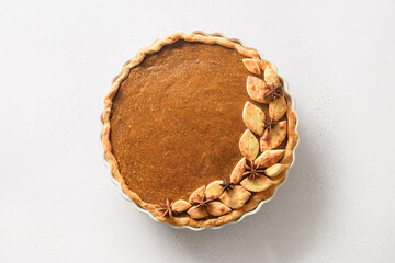 Homemade delicious tasty pumpkin pie with spices,cinnamon,cardamom, ginger for Thanksgiving Day...