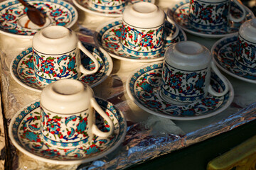 selective focus, turkish coffee cups, indispensable type of coffee in turkey. Turkish coffee on charcoal fire. Turkish Coffee Pot