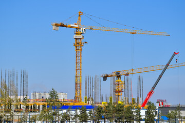 Fototapeta premium port, crane, cargo, ship, sea, harbor, water, dock, industry, industrial, transportation, boat, shipping, transport, harbour, construction, loading, cranes, container, river, sky, vessel, freight, bus