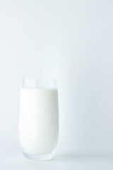 Close up of glass of milk isolated on white background with copy space 