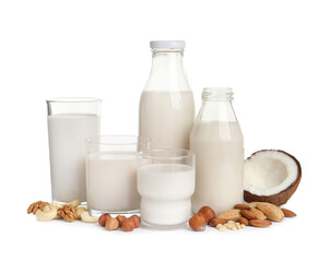 Vegan milk and different nuts on white background