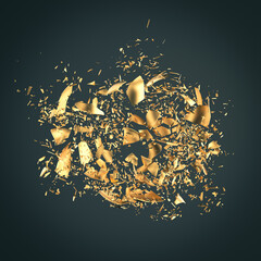 explosion of gold fragments on a dark background.