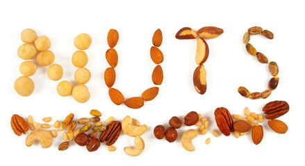 word nuts written using macadamian, almonds, brazilian and pistachio nuts
