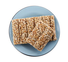 Delicious sweet kozinaki bars on white background, top view