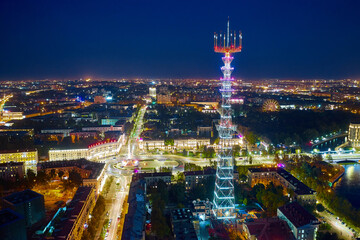 Aerial view of Minsk at night with a view of the TV tower. City center