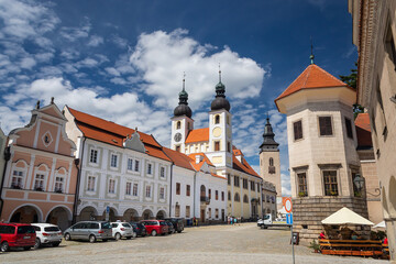Fototapeta premium Telc cityscape in Czech republic, street view of the Church of the Name of Jesus