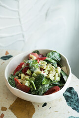 Healthy vegetable salad with yogurt dressing