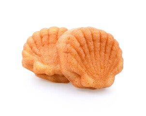 Homemade round sponge cake or chiffon cake on white plate so soft and delicious with ingredients: eggs, flour, milk on wood table. Homemade bakery concept for background and wallpaper.