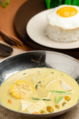 Sayur lodeh  is an Indonesian vegetable soup prepared from vegetables in coconut milk popular in Indonesia. The origin of the dish can be traced to the Javanese people's tradition of Java.
