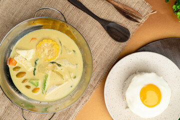 Sayur lodeh  is an Indonesian vegetable soup prepared from vegetables in coconut milk popular in Indonesia. The origin of the dish can be traced to the Javanese people's tradition of Java.