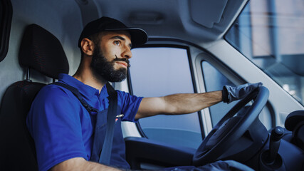 Portrait of Stylish Latin Delivery Truck Driver on the Road. Happy Professional Carefully Driving,...