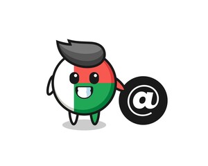 Cartoon Illustration of madagascar flag badge standing beside the At symbol