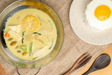 Sayur lodeh  is an Indonesian vegetable soup prepared from vegetables in coconut milk popular in Indonesia. The origin of the dish can be traced to the Javanese people's tradition of Java.