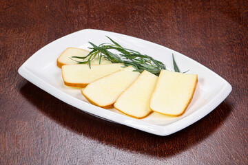 Caucasian tradition cheese plate served herbs