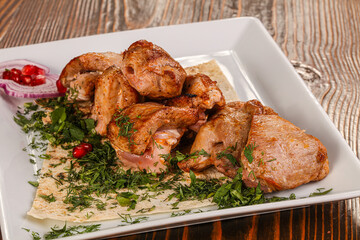 Grilled chicken barbecue served herbs