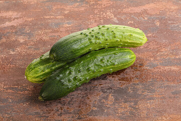 Fersh juicy green cucumbers heap