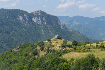 Naklejka premium Rhodopes, are a mountain range in Southeastern Europe. Panorama. The forest area covers the mountains.