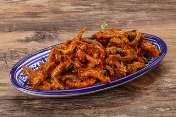 Canned anchovy in tomato sauce