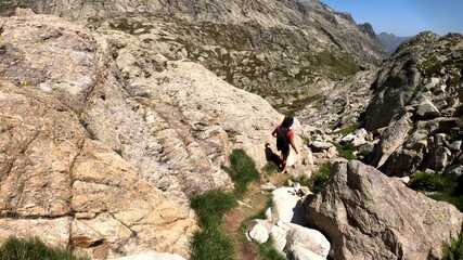 Fototapeta premium young woman hiking in the mountains