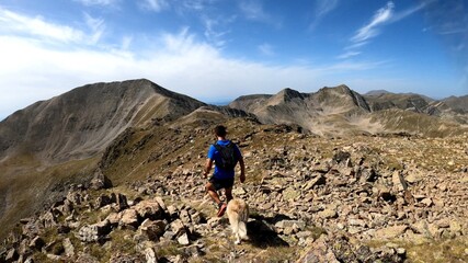 young man hiking in the mountains