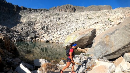 Obraz premium young woman hiking in the mountains