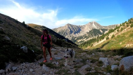 Fototapeta premium young woman hiking in the mountains
